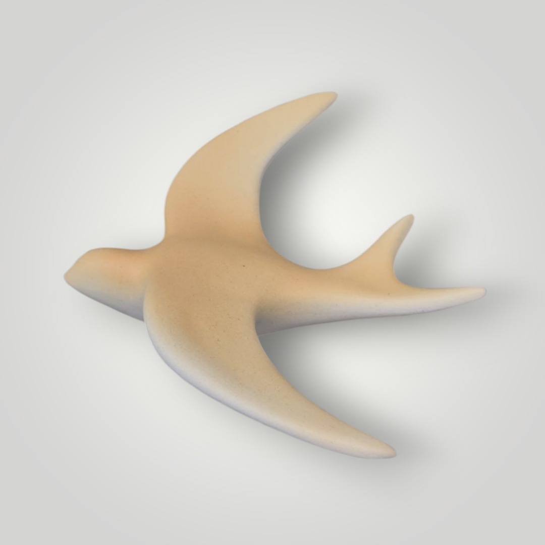 Hirondelle murale dégradée jaune en céramique.