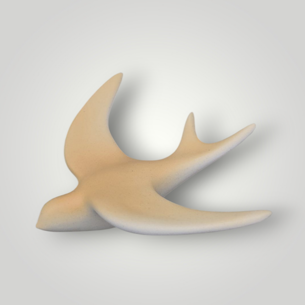 Hirondelle murale dégradée jaune en céramique.