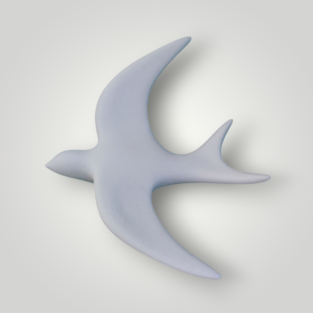 Hirondelle murale ivoire brute naturelle en céramique.