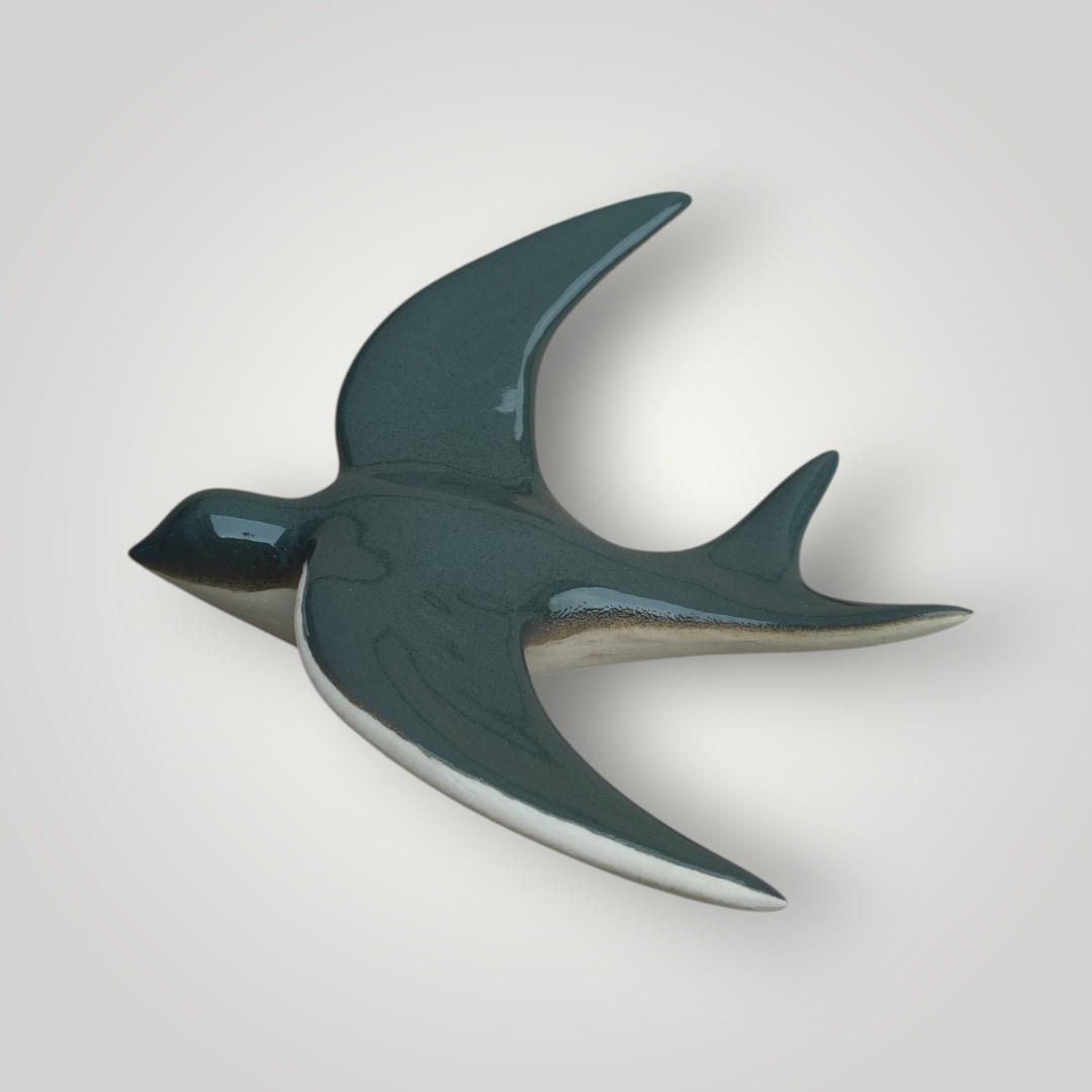 Hirondelle murale vert bouteille dégradée en céramique.